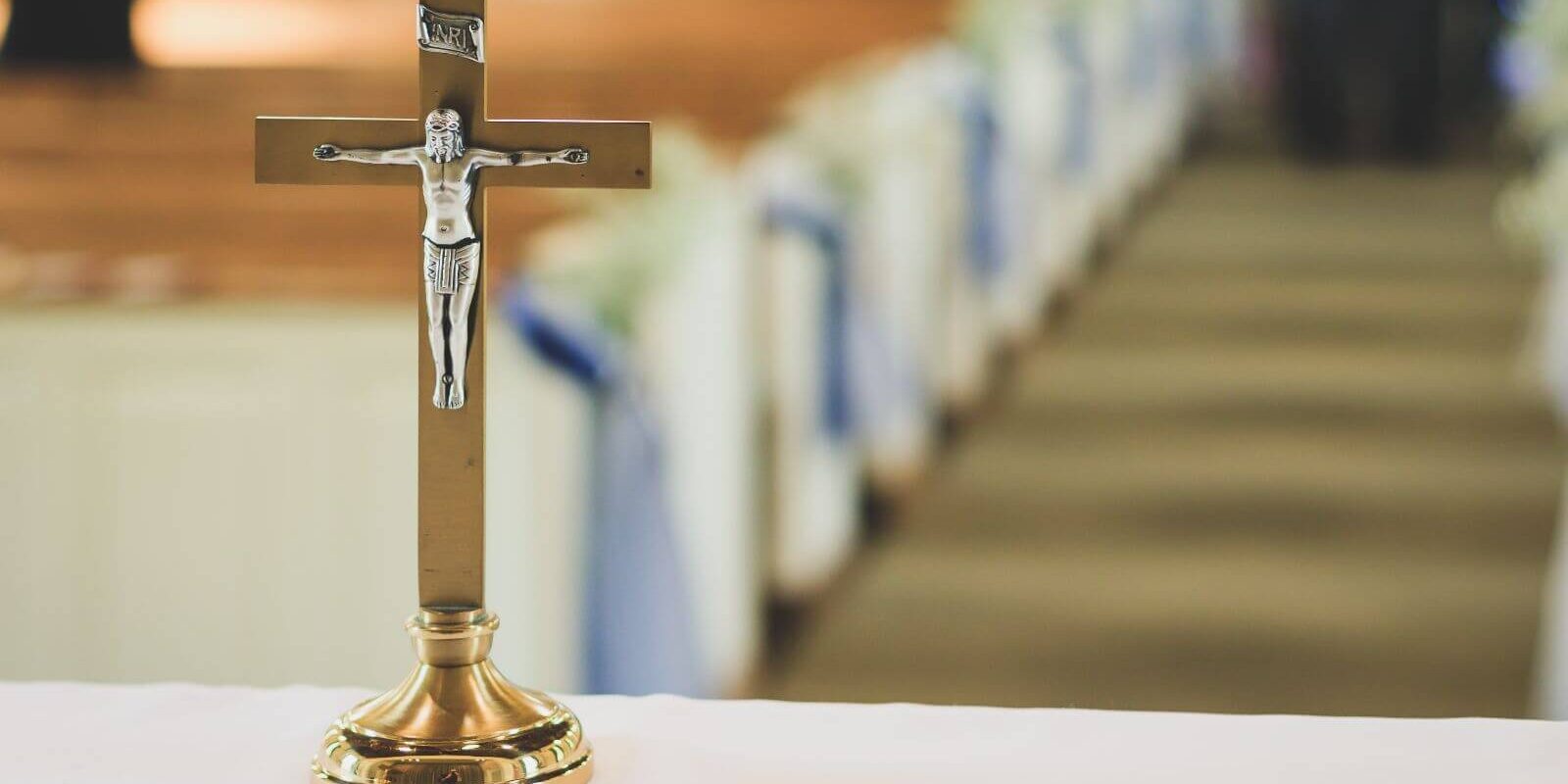 brown-and-silver-cross-table-decor-1533907